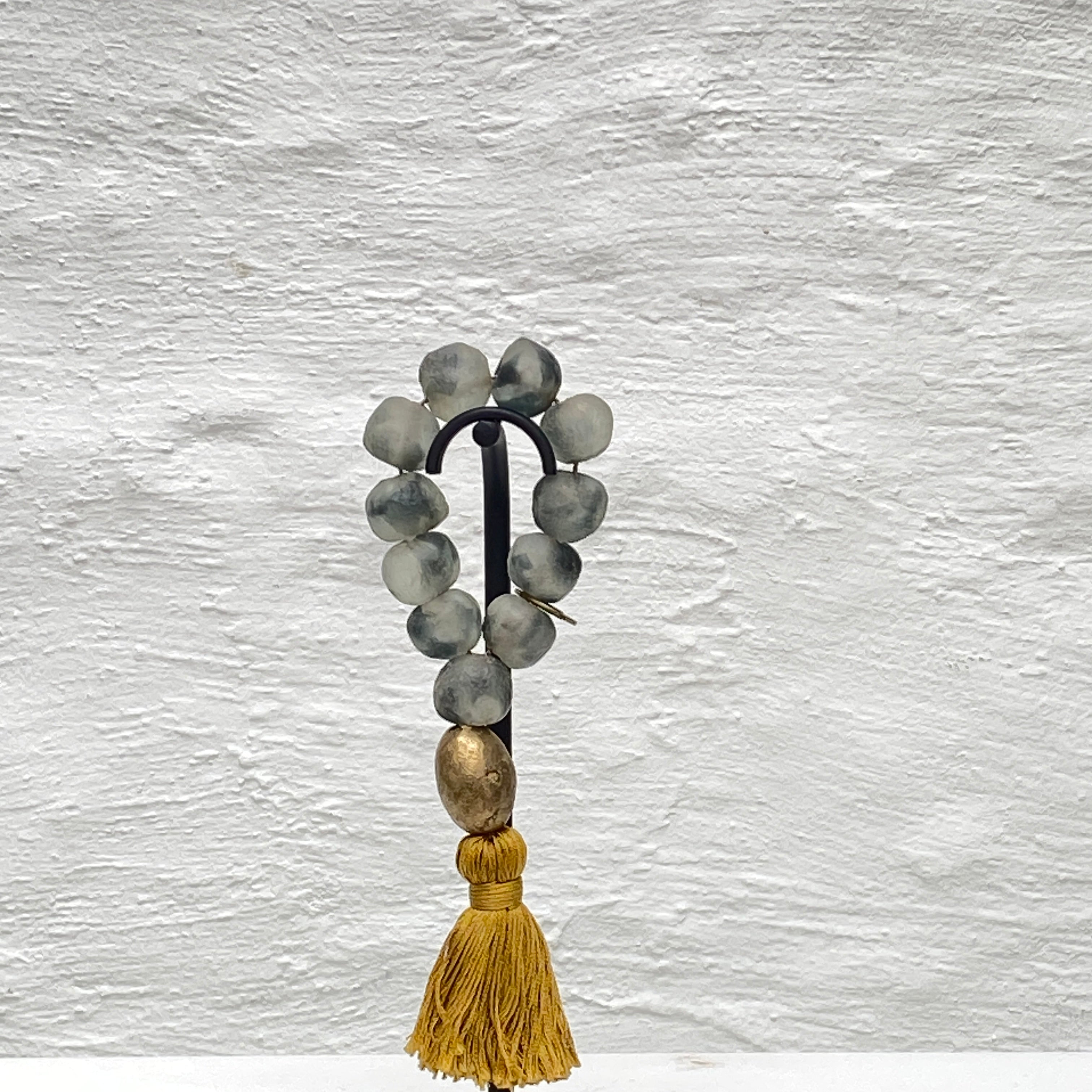 Studio Julia Atlas - Ice grey recycled glass Ghana, bronze, cotton tassel - mini