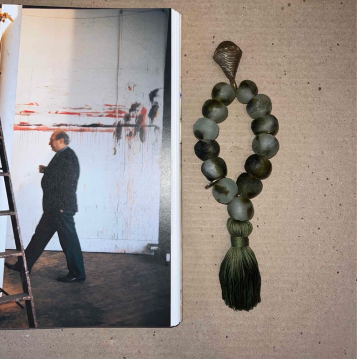 Studio Julia Atlas - Ice green recycled glass Ghana, bronze, cotton tassel - mini